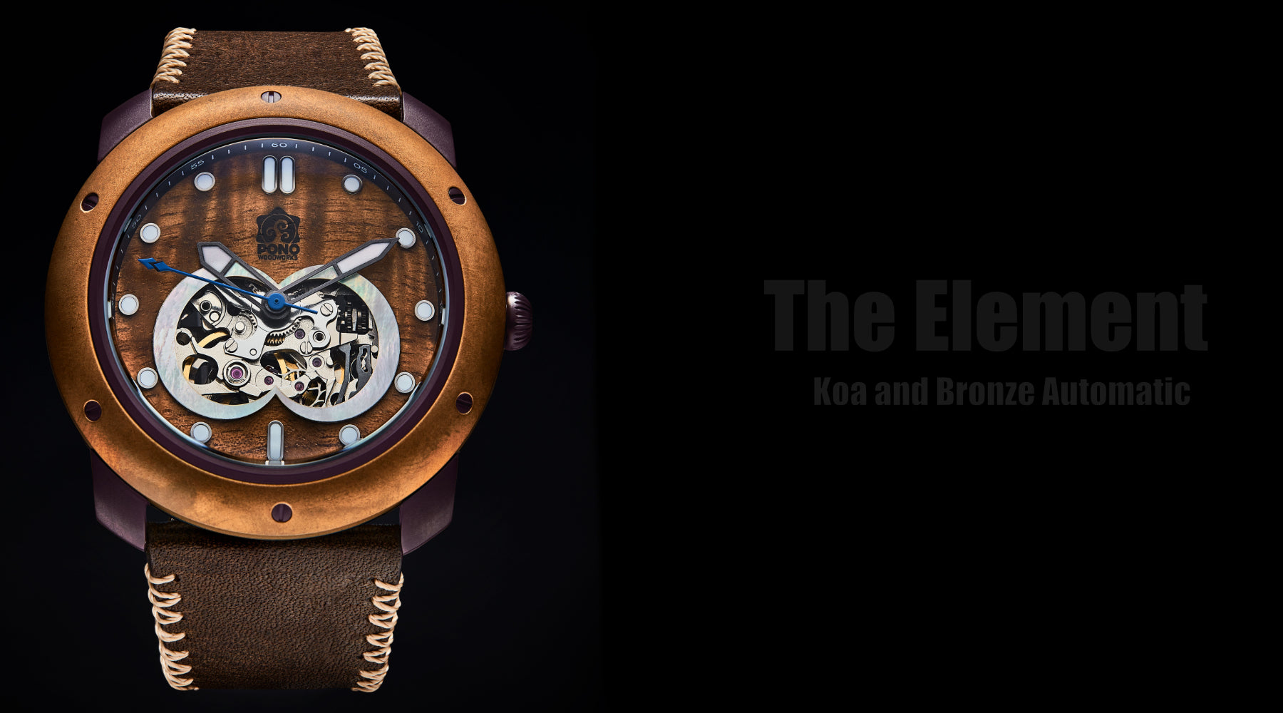 Gunmetal Element bronze bezel koa wood watch on black background