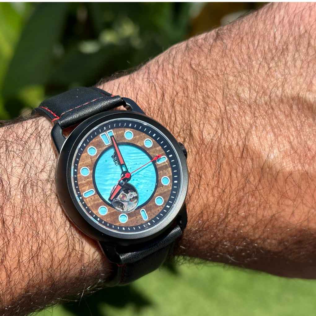 watch on man's wrist to show size