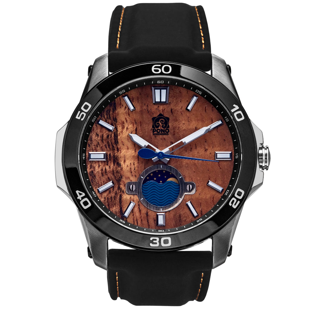 silver body castaway koa wood watch showing crown and moonphase design details, black silicone band