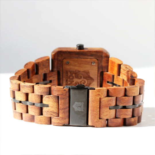 closeup of closed clasp and solid koa band