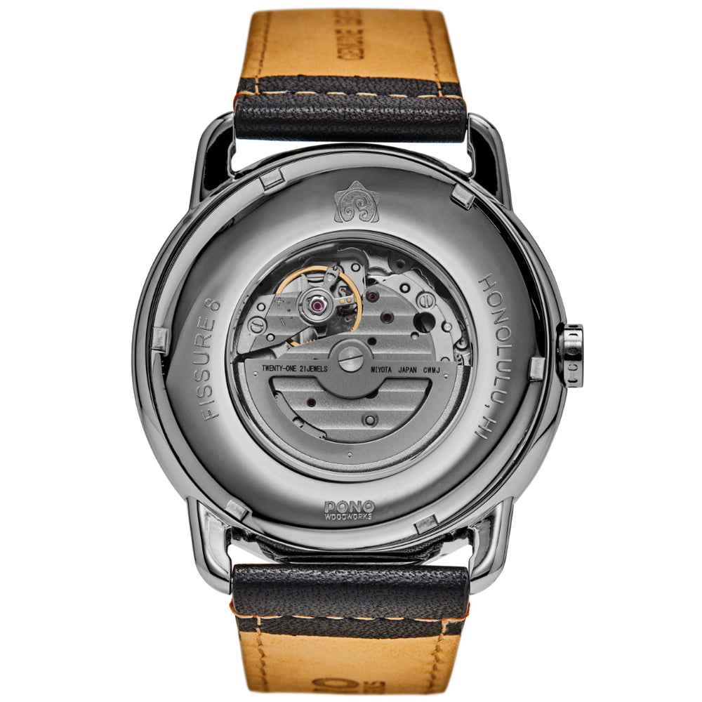 back of silver fissure 8 koa watch showing window to movement