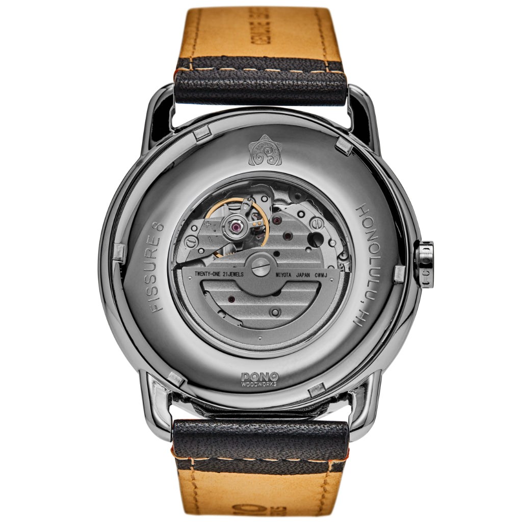 back of silver fissure 8 koa watch showing window to movement