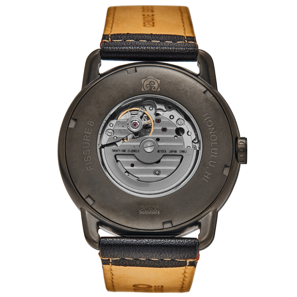 back of gunmetal fissure 8 koa watch showing window to movement