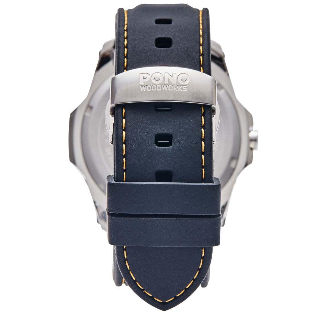 detail of butterfly clasp and black silicone band