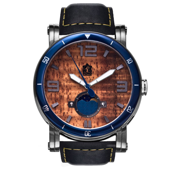 waterman Koa face watch in silver stainless steel showing the design details of water design moon-phase, paddle shaped second hand, sailing winch crown, black leather band