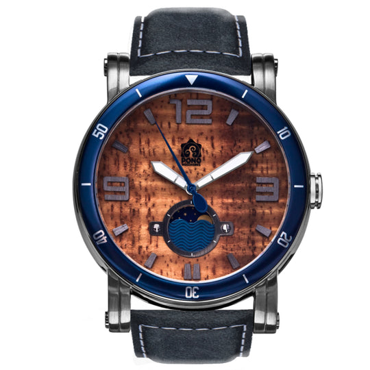 waterman Koa face watch in silver stainless steel showing the design details of water design moon-phase, paddle shaped second hand, sailing winch crown, blue leather band