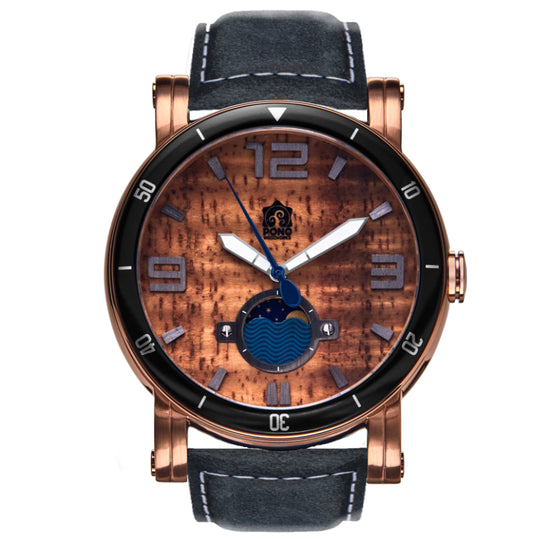 waterman Koa face watch in rose-gold stainless steel showing the design details of water design moon-phase, paddle shaped second hand, sailing winch crown, blue leather band