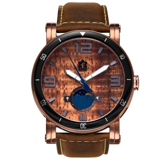 waterman Koa face watch in rose-gold stainless steel showing the design details of water design moon-phase, paddle shaped second hand, sailing winch crown, brown leather band