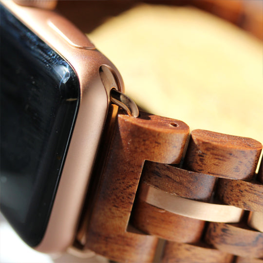 closeup of solid koa links and rosegold stringer