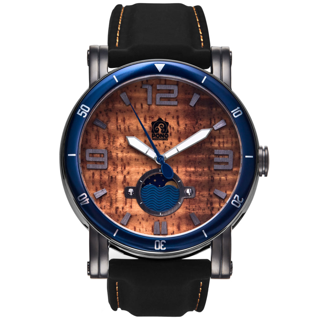 waterman Koa face watch in gunmetal stainless steel showing the design details of water design moon-phase, paddle shaped second hand, sailing winch crown, black silicone band