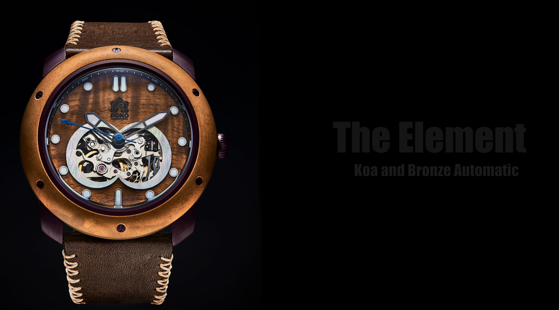 black Element bronze bezel koa wood watch on black background