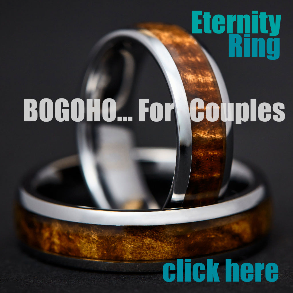 His-and-hers koa wood wedding bands in tungsten and titanium with curly koa inlay