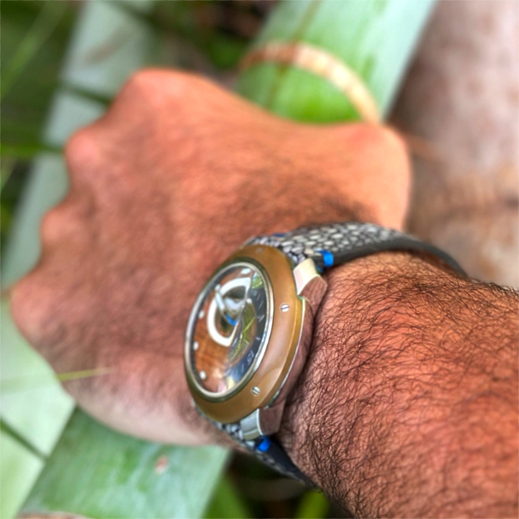 element koa bronze watch on man's wrist