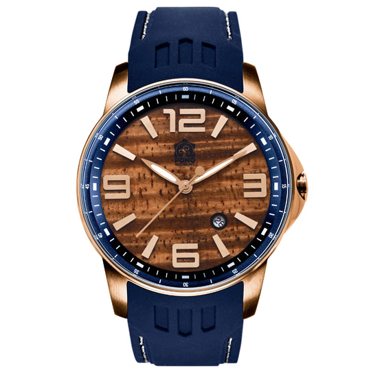 closeup showing gold with blue accent version Surfrider Koa wood watch highlighting design details of wave crown, surfboard shaped hands, navy silicone band