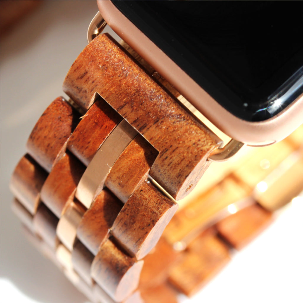 selective focus of koa wood links in iwatch band