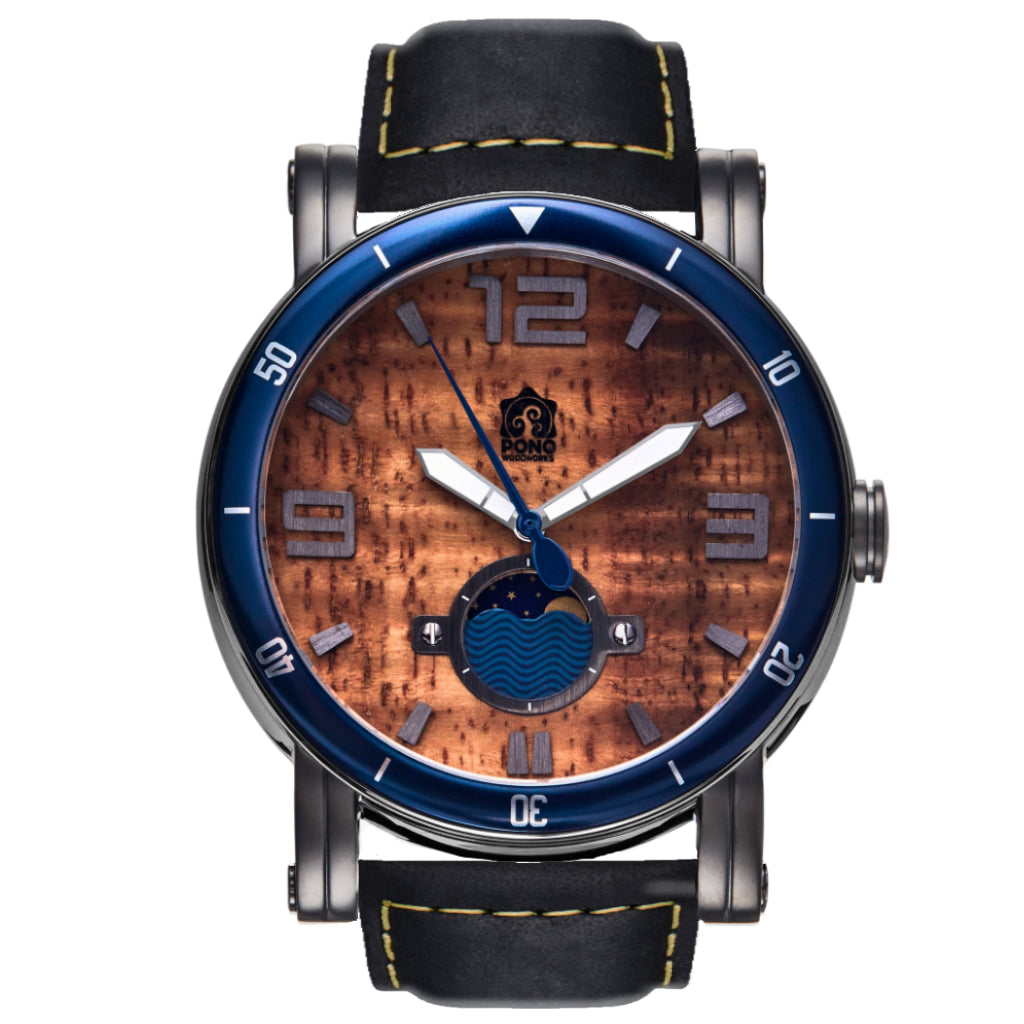 waterman Koa face watch in gunmetal stainless steel showing the design details of water design moon-phase, paddle shaped second hand, sailing winch crown, black leather band