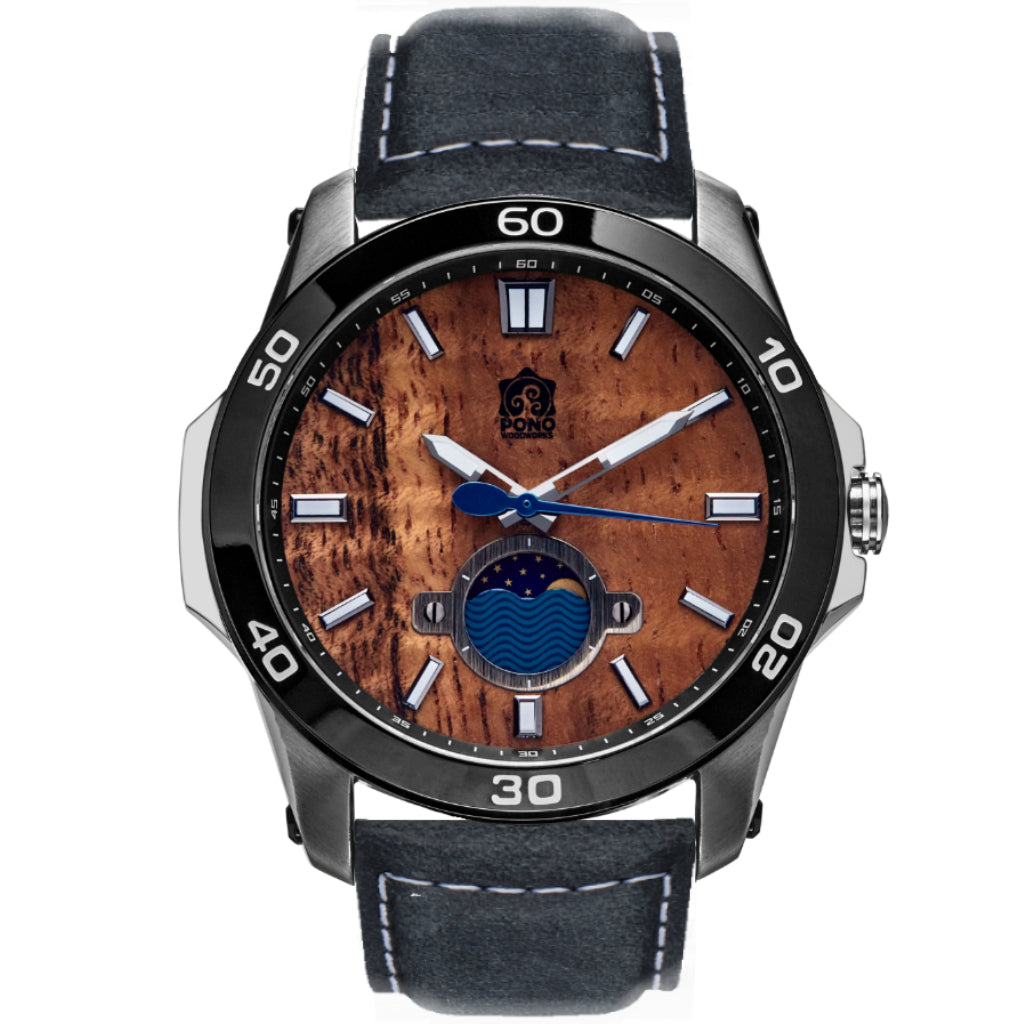 silver body castaway koa wood watch showing crown and moonphase design details, navy leather band