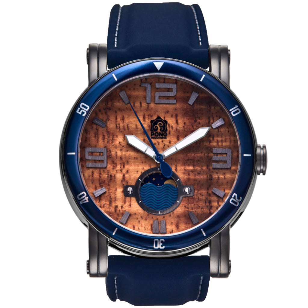 waterman Koa face watch in gunmetal stainless steel showing the design details of water design moon-phase, paddle shaped second hand, sailing winch crown, blue silicone band