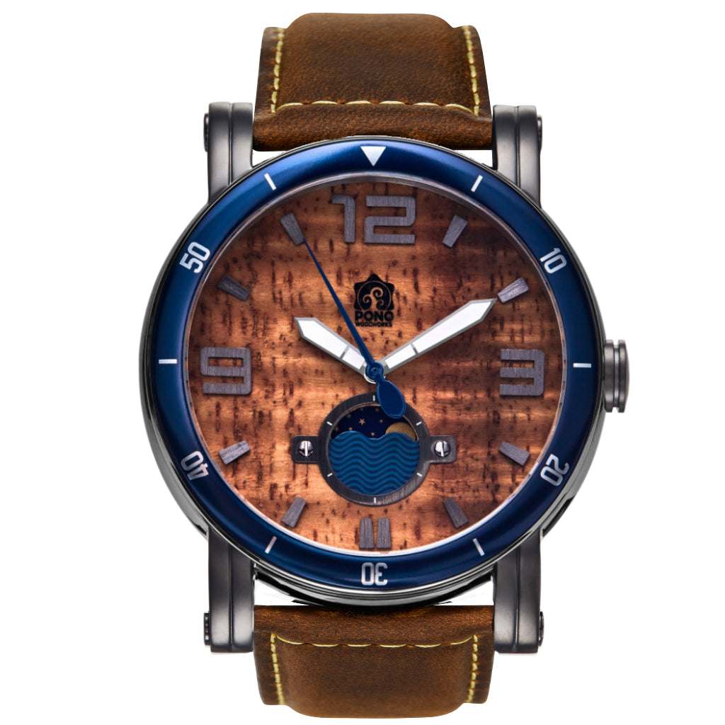 waterman Koa face watch in gunmetal stainless steel showing the design details of water design moon-phase, paddle shaped second hand, sailing winch crown, brown leather band