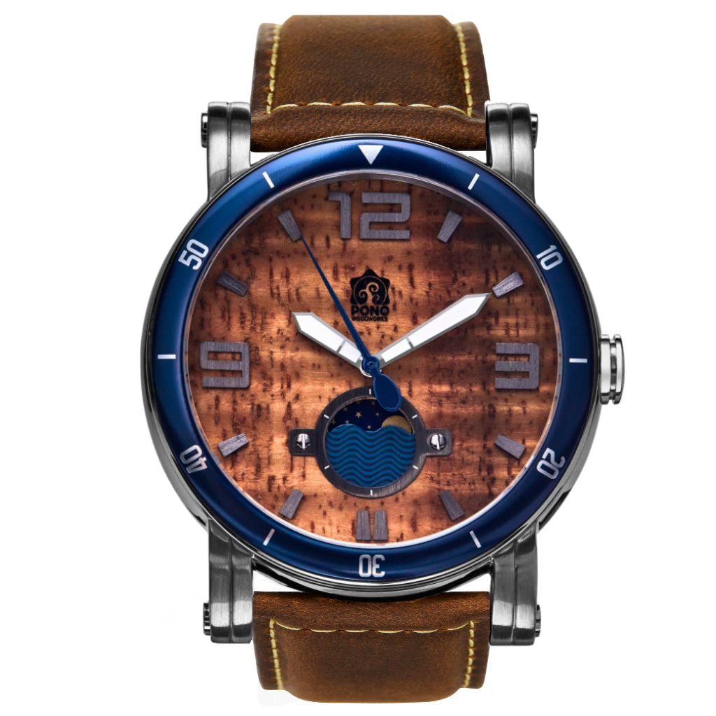 waterman Koa face watch in silver stainless steel showing the design details of water design moon-phase, paddle shaped second hand, sailing winch crown, brown leather band