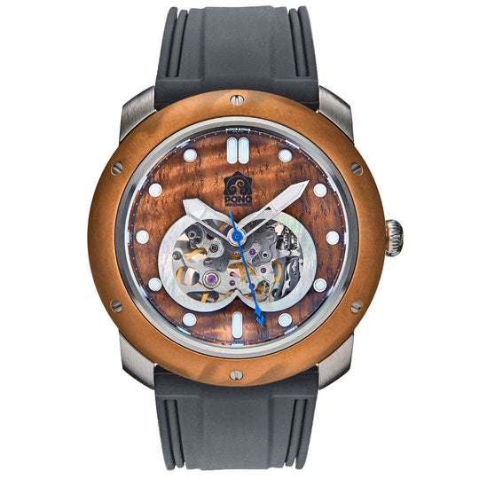 front view of automatic skeleton movement koa wood watch with bronze bezel and black stainless body, black silicone band
