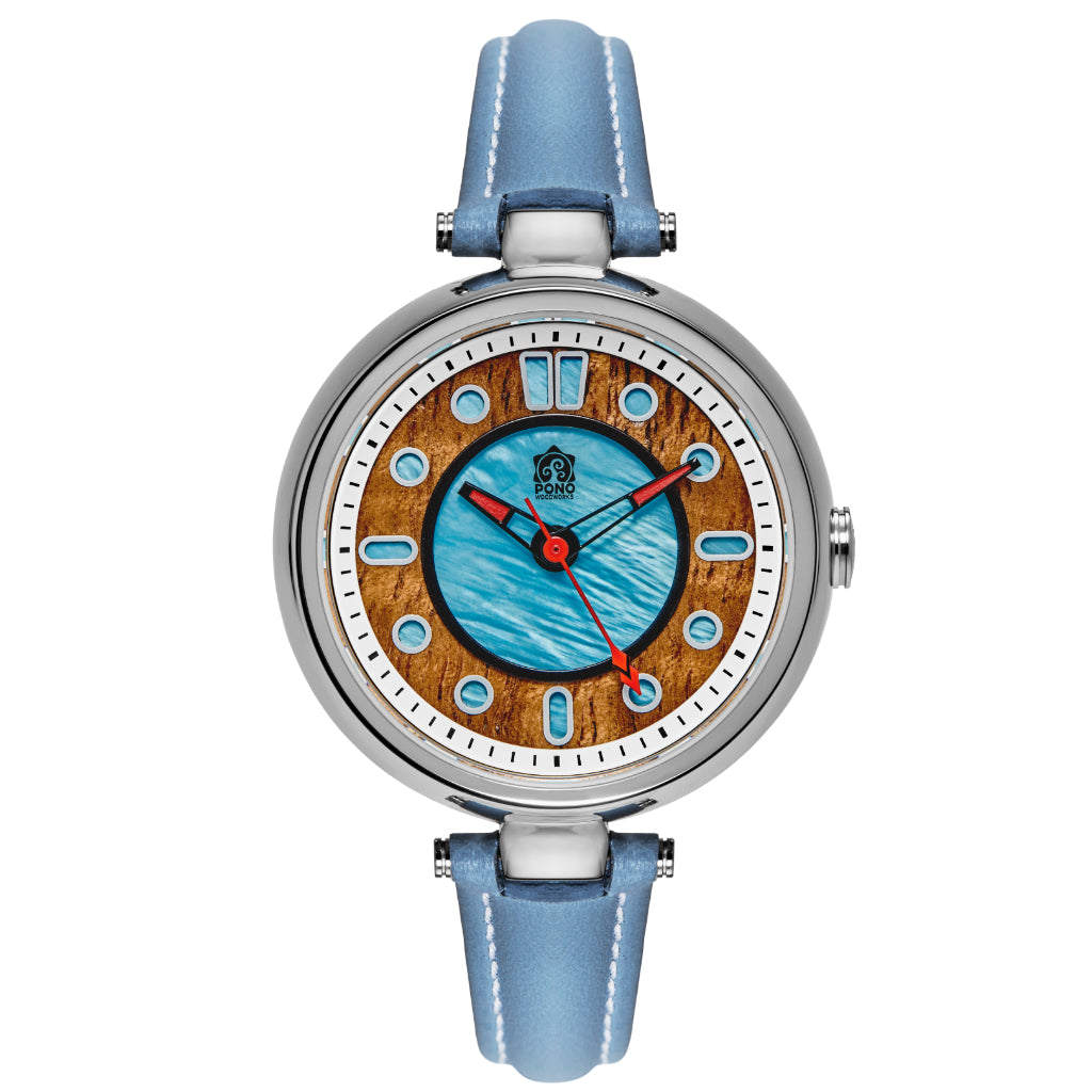 Fissure 8 womens silver showing details of face, koa wood, abalone, hollow minute markers and light blue leather band