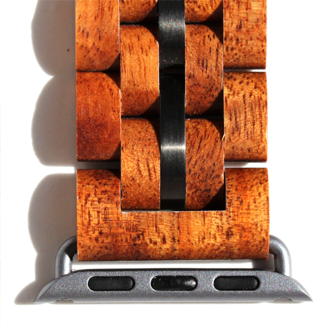 closeup of solid koa links and iwatch adapter