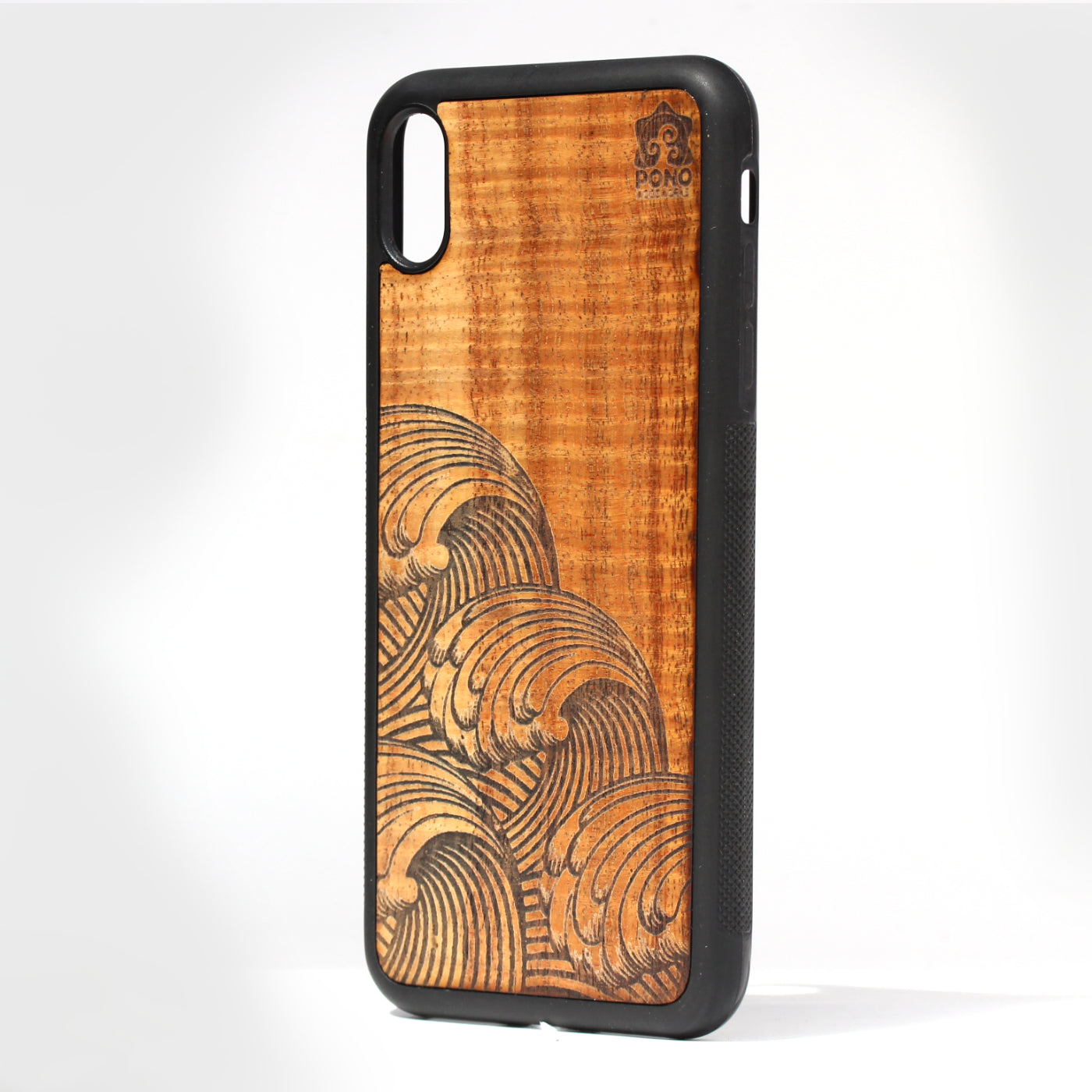 exquisite curly koa wood inlay phone case standing upright showing a Japanese Wave design laser etched into the wood