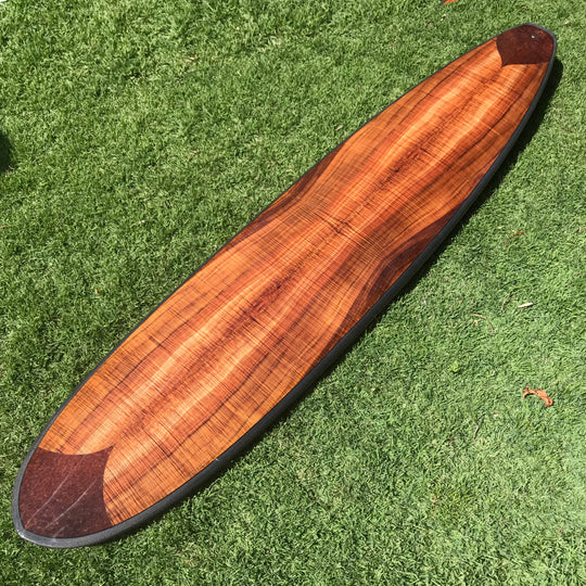 9' longboard with curly koa body and redwood burl ends