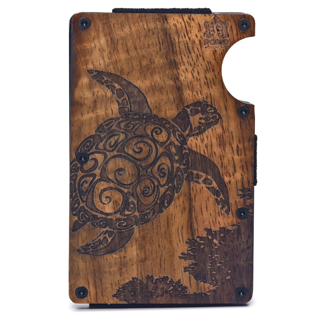 front view of curly grained koa wood face on a minimalist edc wallet, laser turtle honu design