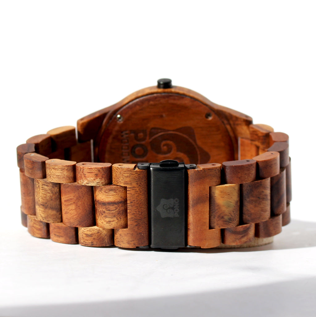 closeup of closed clasp of koa wood watch