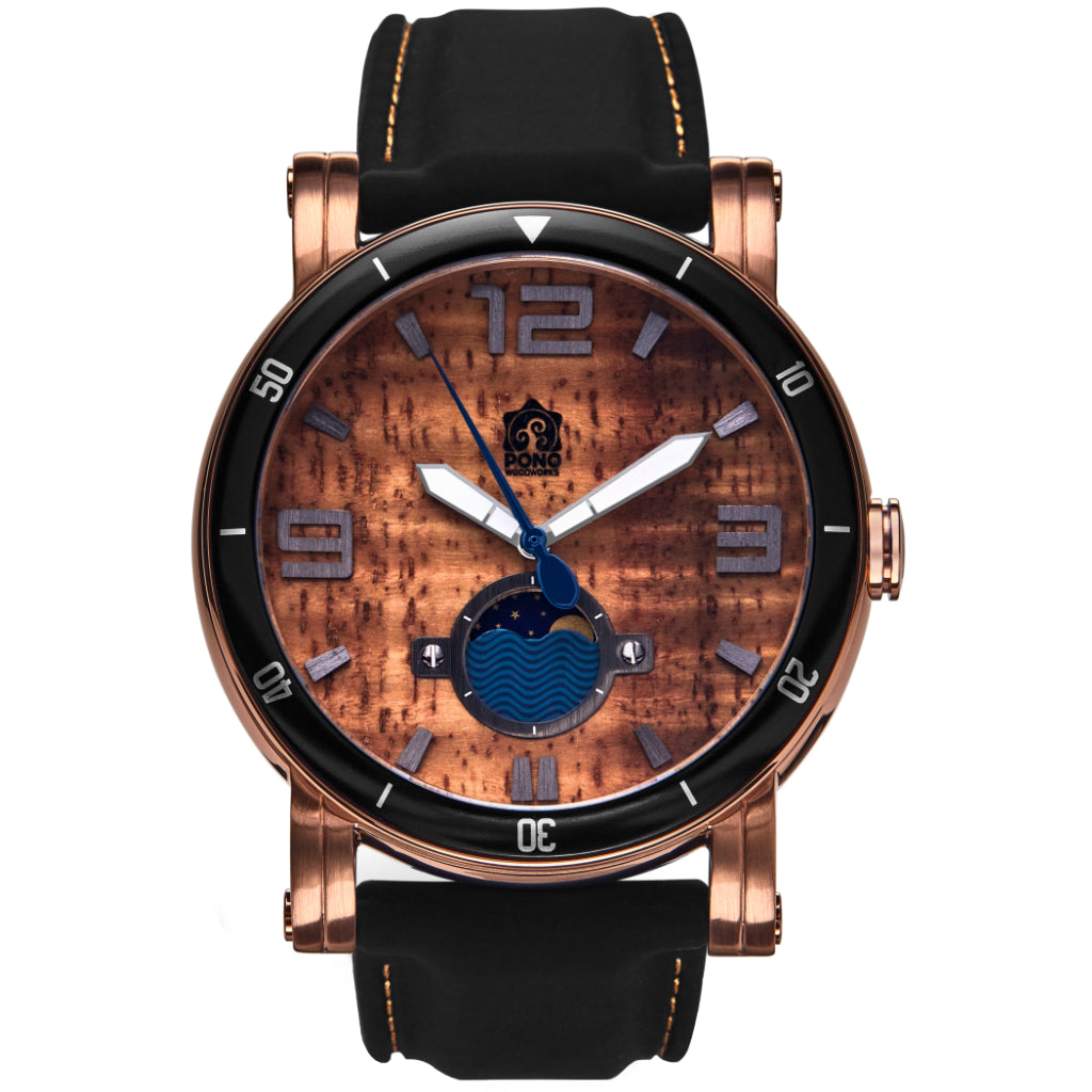 waterman Koa face watch in rose-gold stainless steel showing the design details of water design moon-phase, paddle shaped second hand, sailing winch crown, black silicone band
